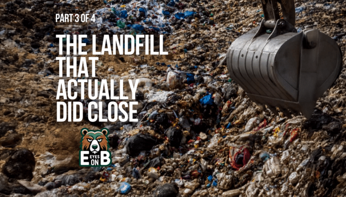 A close-up of a landfill working face covered in mixed refuse and plastic waste, with the steel bucket of an excavator lowered into the frame at right. Overlaid title card reads: Eyes on EB, Part 3 of 4, The Landfill That Actually Did Close.